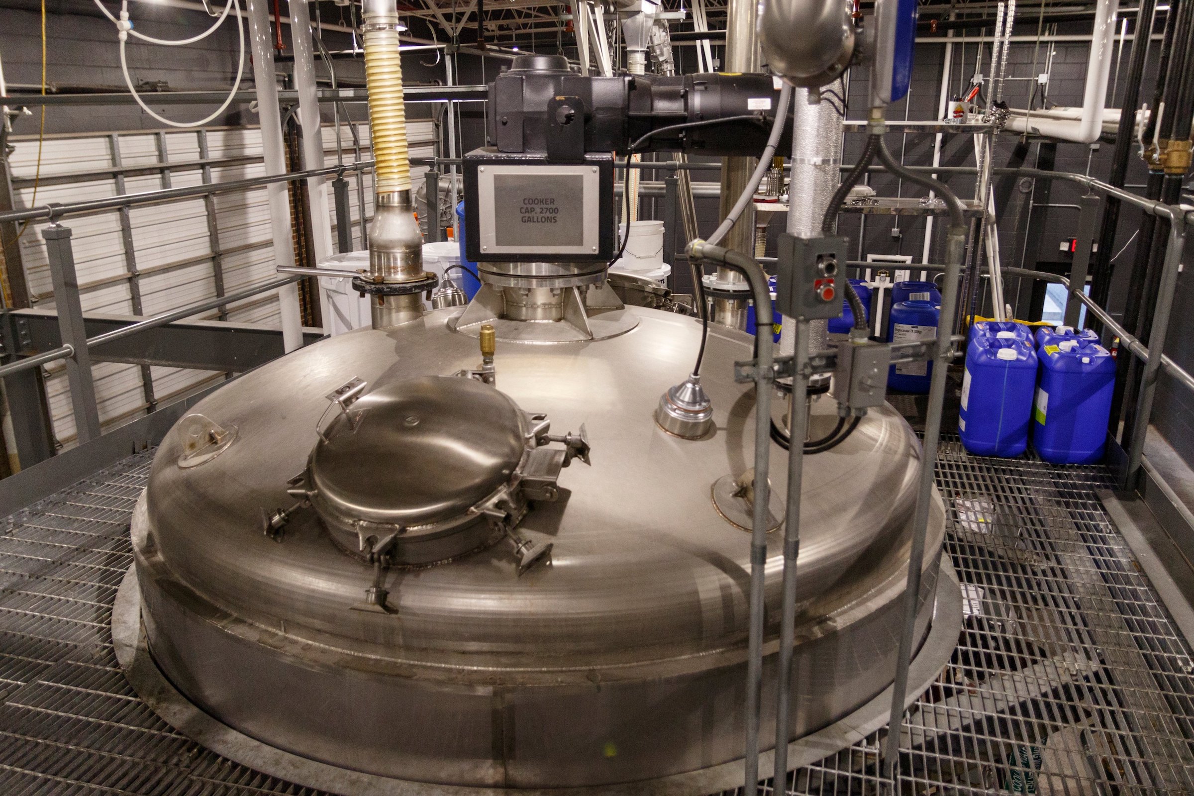 A cooker is operated at Chattanooga Whiskey's Martin Luther King Boulevard distillery on Wednesday, July 31, 2019, in Chattanooga, Tenn.. The company is in the process of releasing its new high-malt whiskey line made entirely in Chattanooga.