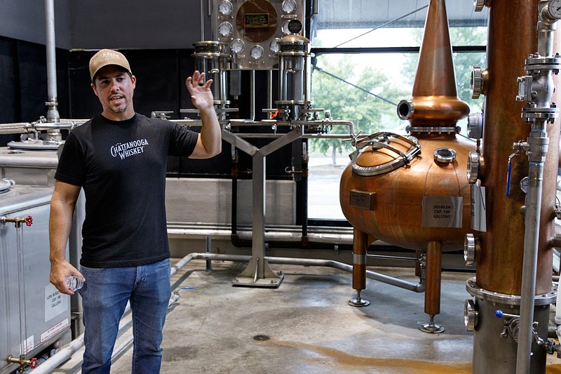Co-founder and CEO Tim Piersant talks about the distilling process at Chattanooga Whiskey's Martin Luther King Boulevard distillery on Wednesday, July 31, 2019, in Chattanooga, Tenn.. The company is in the process of releasing its new high-malt whiskey line made entirely in Chattanooga.