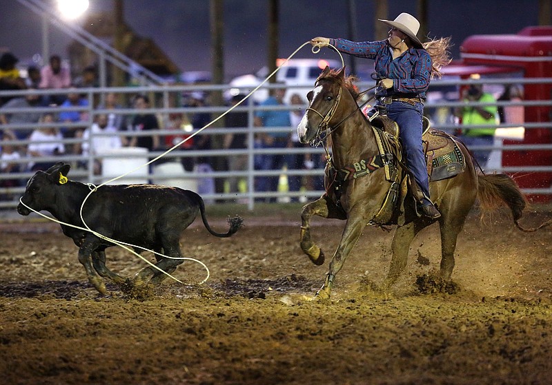 Brittany Smith competes in the breakaway roping event during the St. Jude Childrenճ Hospital Rodeo at Yates Farm Friday, August 2, 2019 in Ringgold, Georgia.
