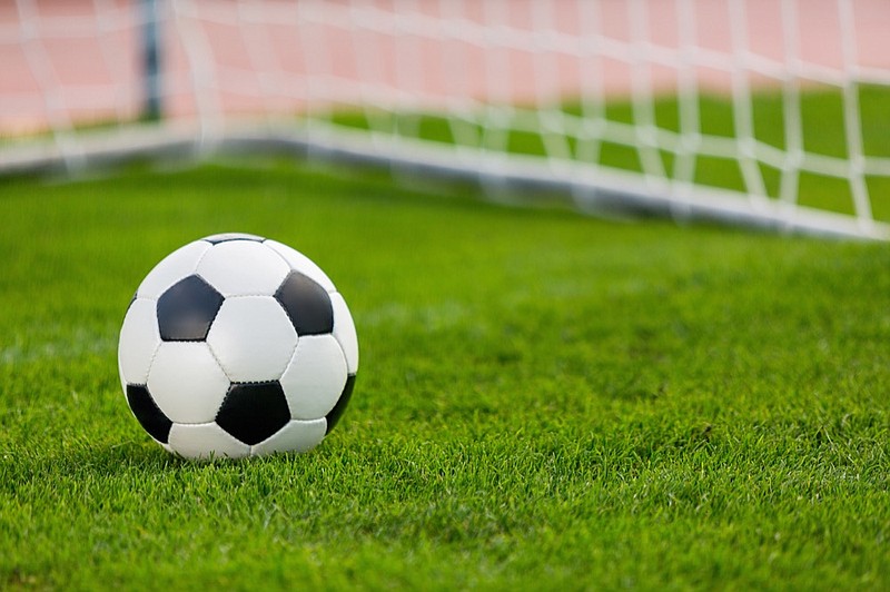 Closeup of a Soccer Ball and Goalpost soccer tile / Getty Images
