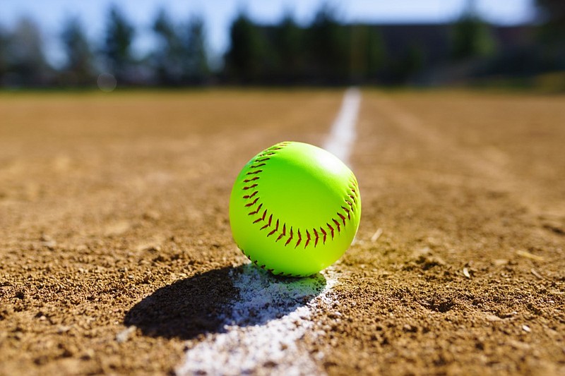 Softball in a softball field in California mountains on a white line softball field softball tile / Getty Images
