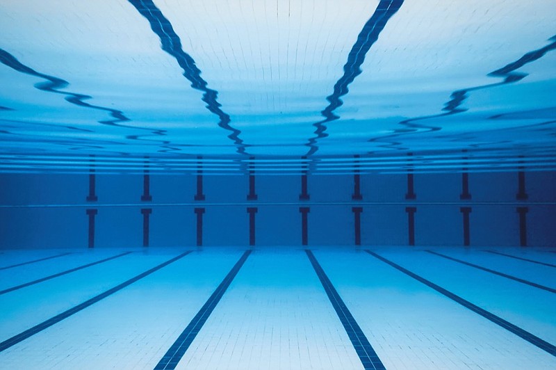 Underwater Empty Swimming Pool swim tile swim sport / Getty Images
