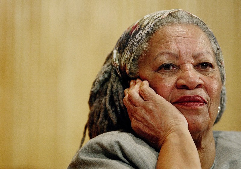 In this Nov. 25, 2005, file photo, author Toni Morrison listens to Mexicos Carlos Monsivais during the Julio Cortazar professorship conference at the Guadalajara's University in Guadalajara City, Mexico. The Nobel Prize-winning author has died. Publisher Alfred A. Knopf says Morrison died Monday, Aug. 5, 2019 at Montefiore Medical Center in New York. She was 88. (AP Photo/Guillermo Arias, File)