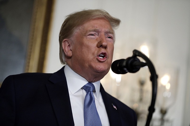 In this Aug. 5, 2019, photo, President Donald Trump speaks about the mass shootings in El Paso, Texas and Dayton, Ohio, in the Diplomatic Reception Room of the White House in Washington. As Trump attempts to return to the role of national unifier after yet another set of shooting tragedies, his efforts to heal a divided nation are further complicated by his own role in stoking the kind of incendiary rhetoric that appears to have inspired one of the shooters (AP Photo/Evan Vucci)