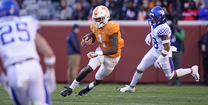 Tennessee's Marquez Callaway gains yardage against Kentucky in the first quarter of game action at Neyland Stadium. / Photo by Patrick Murphy-Racey