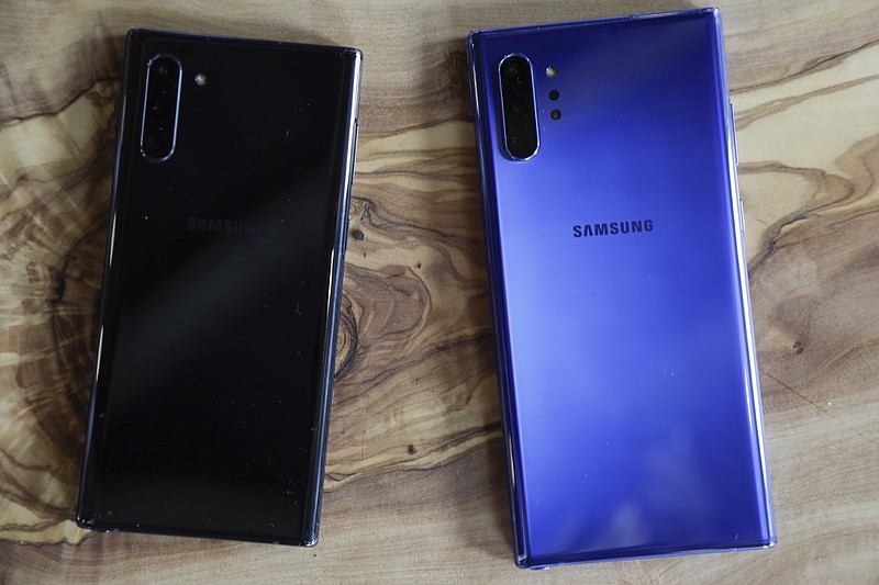 In this Monday, Aug. 5, 2019, photo the Samsung Galaxy Note 10, left, and the Galaxy Note 10 Plus is shown in New York. The Note 10, announced Wednesday, Aug. 7, squeezes in more battery power and other goodies, but at the cost of the familiar old jack. So now the company is doing an about-face and declaring that many people use wireless headphones anyway. (AP Photo/Frank Franklin II)