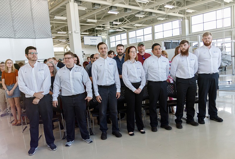 Volkswagen Academy students stand in place for a graduation ceremony at Volkswagen Academy on Thursday, Aug. 8, 2019, in Chattanooga.