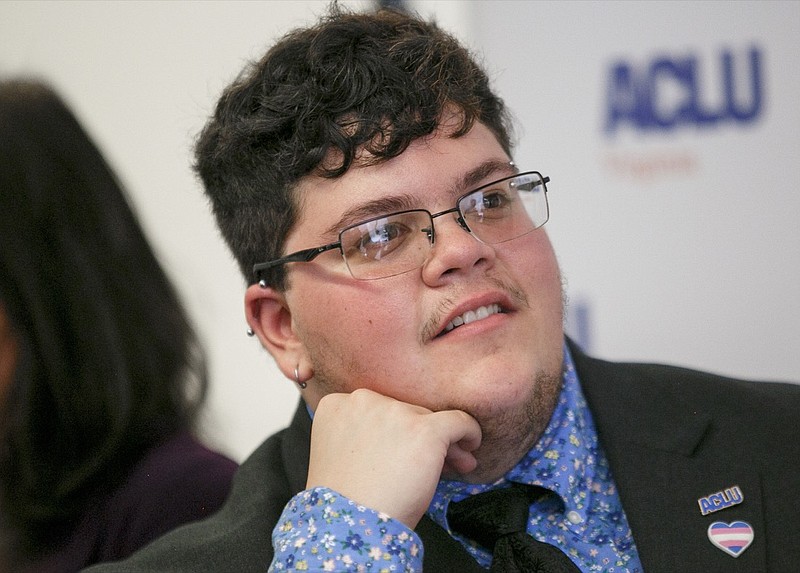 In this Tuesday, July 23, 2019, file photo, Gavin Grimm, who has become a national face for transgender students, speaks during a news conference held by The ACLU and the ACLU of Virginia at Slover Library in Norfolk, Va. A federal judge in Virginia ruled Friday, Aug. 9, 2019, that a school board's transgender bathroom ban discriminated against former student Grimm. (Kristen Zeis/The Daily Press via AP, File)