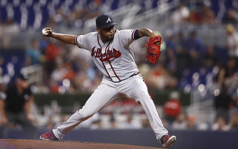 Atlanta Braves starting pitcher Julio Teheran delivers during the first inning of the team's baseball game against the Miami Marlins on Friday, Aug. 9, 2019, in Miami. (AP Photo/Brynn Anderson)