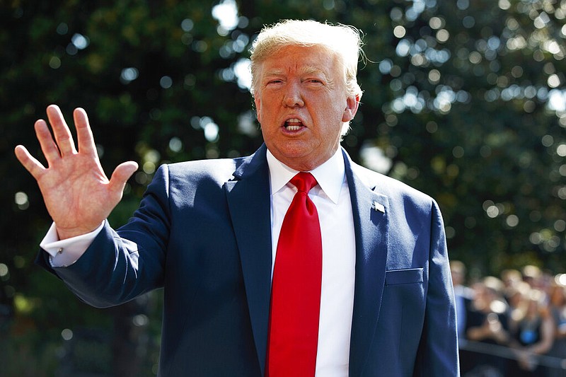 President Donald Trump talks to reporters on the South Lawn of the White House, Friday, Aug. 9, 2019, in Washington, as he prepares to leave Washington for his annual August holiday at his New Jersey golf club.