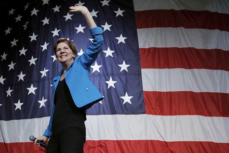 Democratic presidential candidate Sen. Elizabeth Warren, D-Mass., waves after speaking at the Iowa Democratic Wing Ding at the Surf Ballroom, Friday, Aug. 9, 2019, in Clear Lake, Iowa. (AP Photo/John Locher)