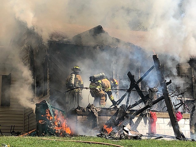 First responders put out a house fire on Lillian Lane August 11, 2019. A teenager suffered burns and was transported to Erlanger Medical Center (Contributed photo courtesy of Battalion Chief David Thompson).