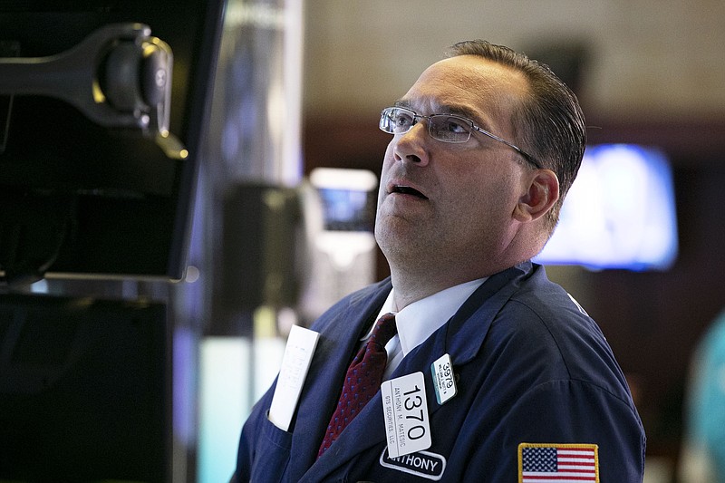 Specialist Anthony Matsic works at his post on the floor of the New York Stock Exchange, Monday, Aug. 12, 2019. Stocks are edging lower in early trading on Wall Street amid investor concerns that the U.S.-China trade war may be worsening. (AP Photo/Richard Drew)