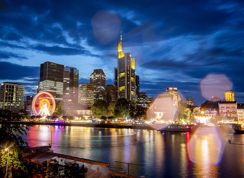 Raindrops on the camera lens reflect the lights of the Mainfest event at the river Main in Frankfurt, Germany, late Friday, Aug. 2, 2019. (AP Photo/Michael Probst)