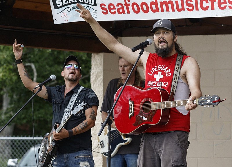 Clayton Quisenberry performs during the Seafood Music Fest at the Cleveland Greenway on Saturday, Aug. 18, 2018, in Cleveland, Tenn.