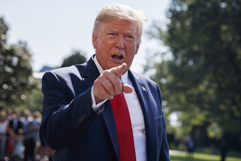 In this Aug. 9, 2019, photo, President Donald Trump talks to reporters on the South Lawn of the White House in Washington. Trump is showcasing the growing effort to capitalize on western Pennsylvania's natural gas deposits by turning gas into plastics. (AP Photo/Evan Vucci)