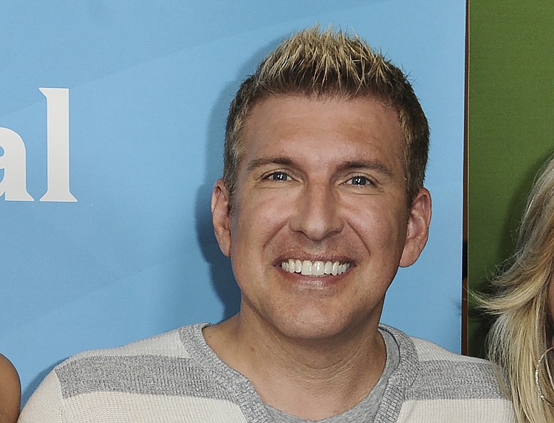 FILE - In this July 14, 2014, file photo, Todd Chrisley attends the NBC 2014 Summer TCA at the Beverly Hilton Hotel in Beverly Hills, Calif. A federal grand jury in Atlanta on Tuesday, Aug. 13, 2019, indicted reality television star Chrisley on tax evasion and other charges. (Photo by Richard Shotwell/Invision/AP, File)