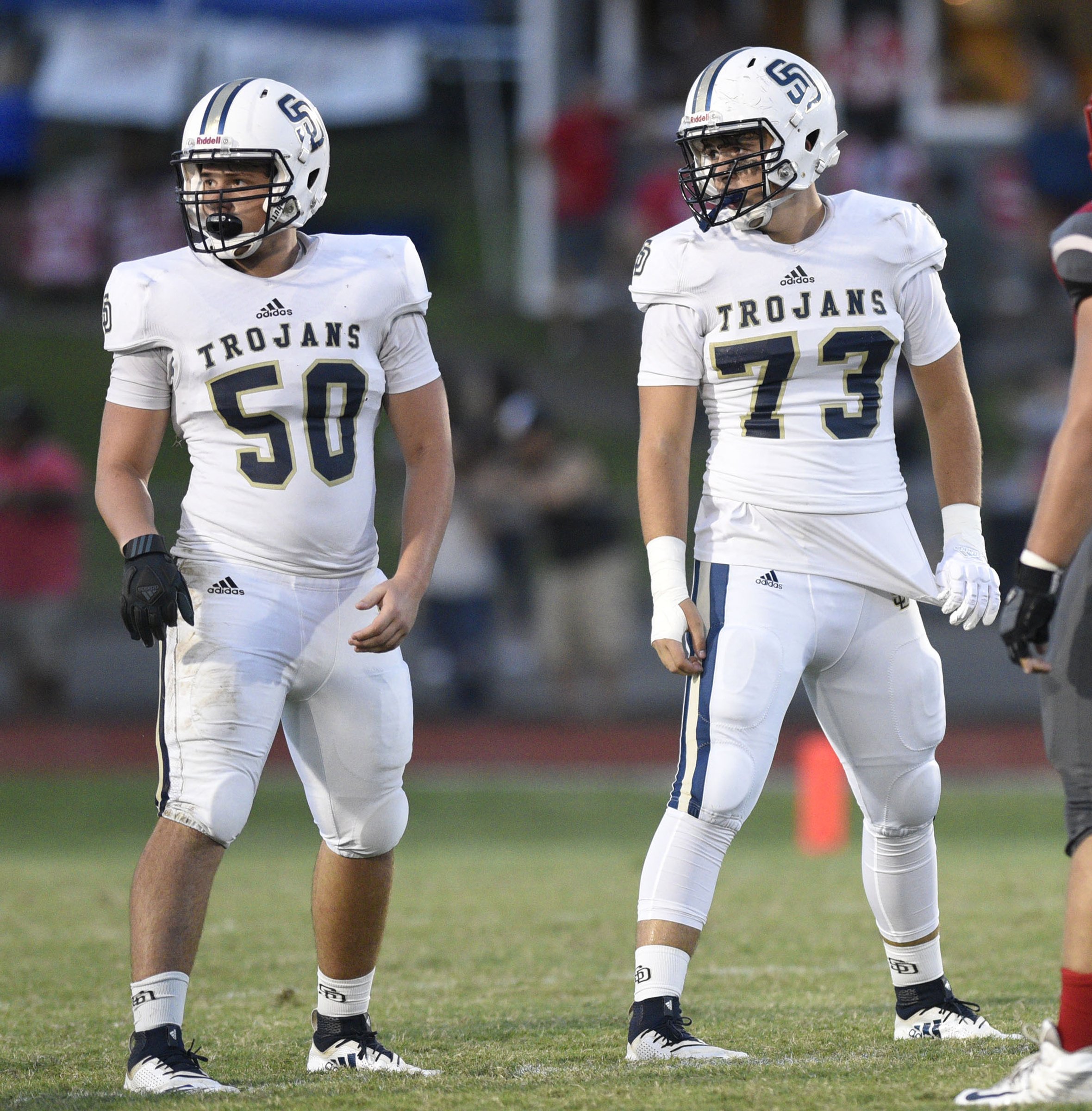 Jonathan Rathman (50) and Peyton Bell (73) play on the line for the Trojans. The Soddy-Daisy Trojans visited the Ooltewah Owls in a TSSAA rivalry game on September 21, 2018.