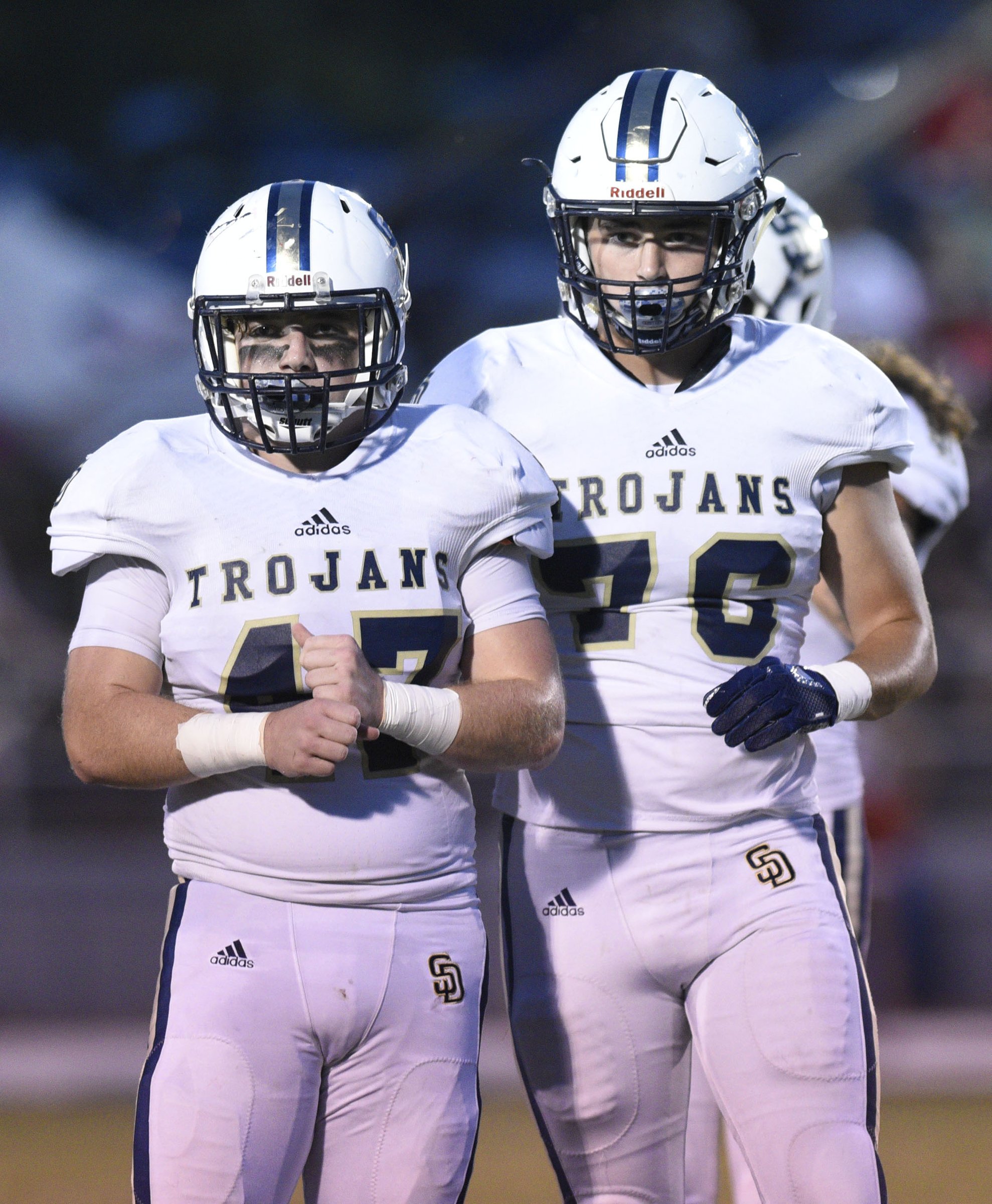 Ben Jenkins (47) and Preston Begley (76) look to the bench. The Soddy-Daisy Trojans visited the Ooltewah Owls in a TSSAA rivalry game on September 21, 2018.