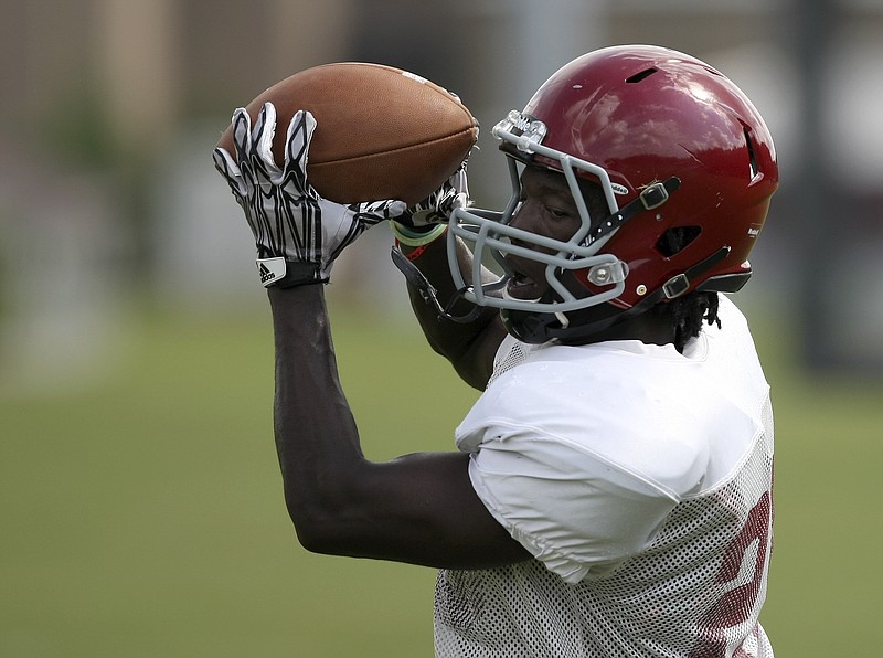 Southeast Whitfield's Henry Vassel catches a pass during a drill during practice at Southeast Whitfield High School on Thursday, Aug. 3, in Dalton, Ga.