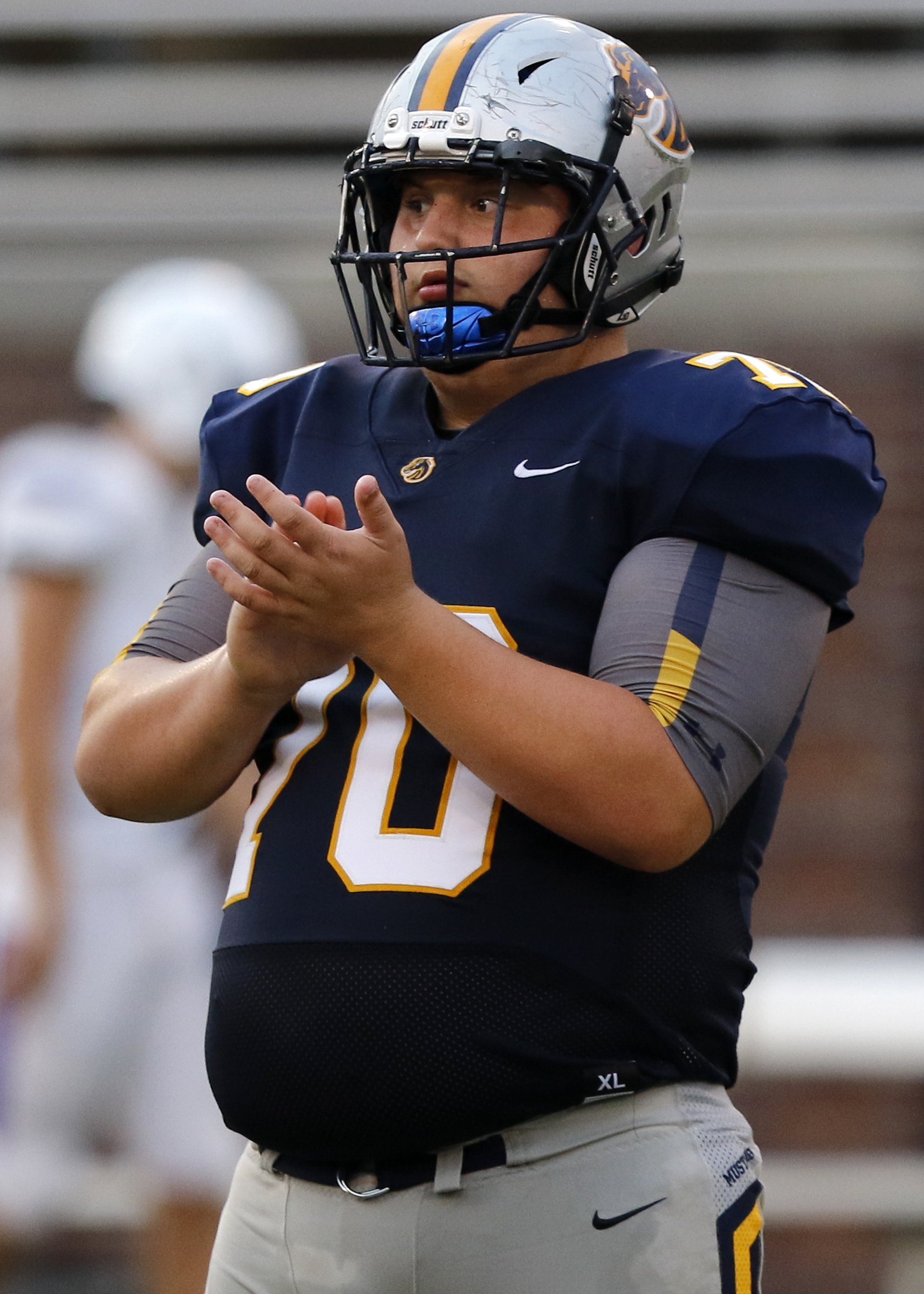 Walker Valley's Hayden Gibson (70) claps after converting a fourth down against Central during the first game of the Chattanooga Kickoff Classic at Finley Stadium on Thursday, Aug. 16, 2018 in Chattanooga, Tenn.