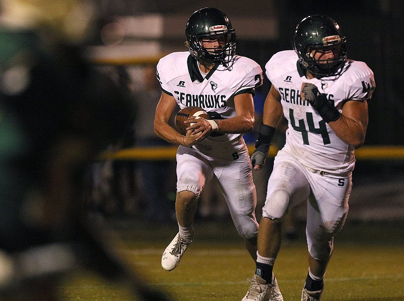 Silverdale's Connor Delashmitt (29) runs the ball with a Curtis Dearing (44) blocking for him during the Notre Dame vs. Silverdale Baptist football game Friday, October 5, 2018 at Notre Dame in Chattanooga, Tennessee. 