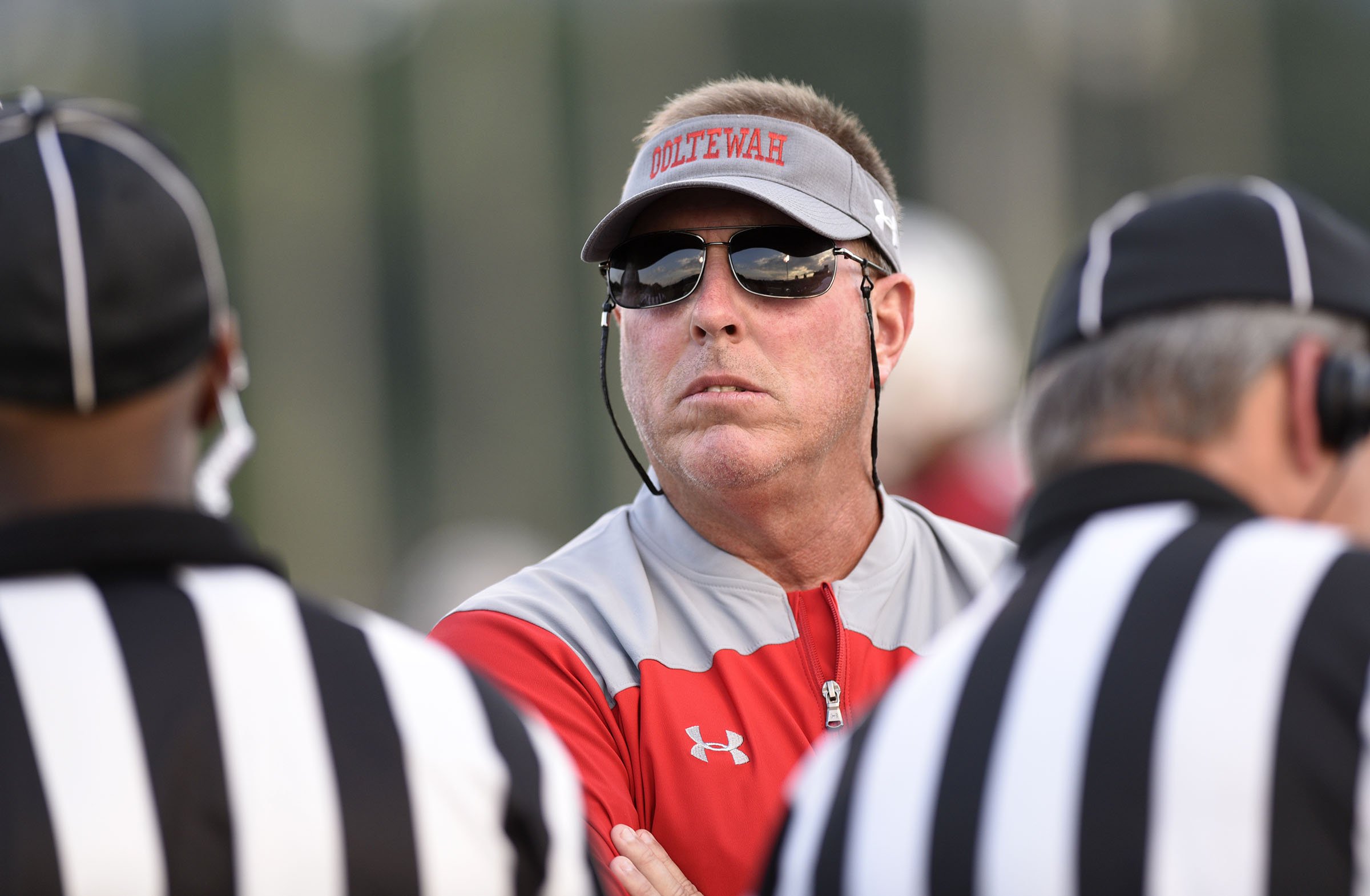 Ooltewah head coach Scott Chandler speaks to the officials before the game. The Soddy-Daisy Trojans visited the Ooltewah Owls in a TSSAA rivalry game on September 21, 2018.