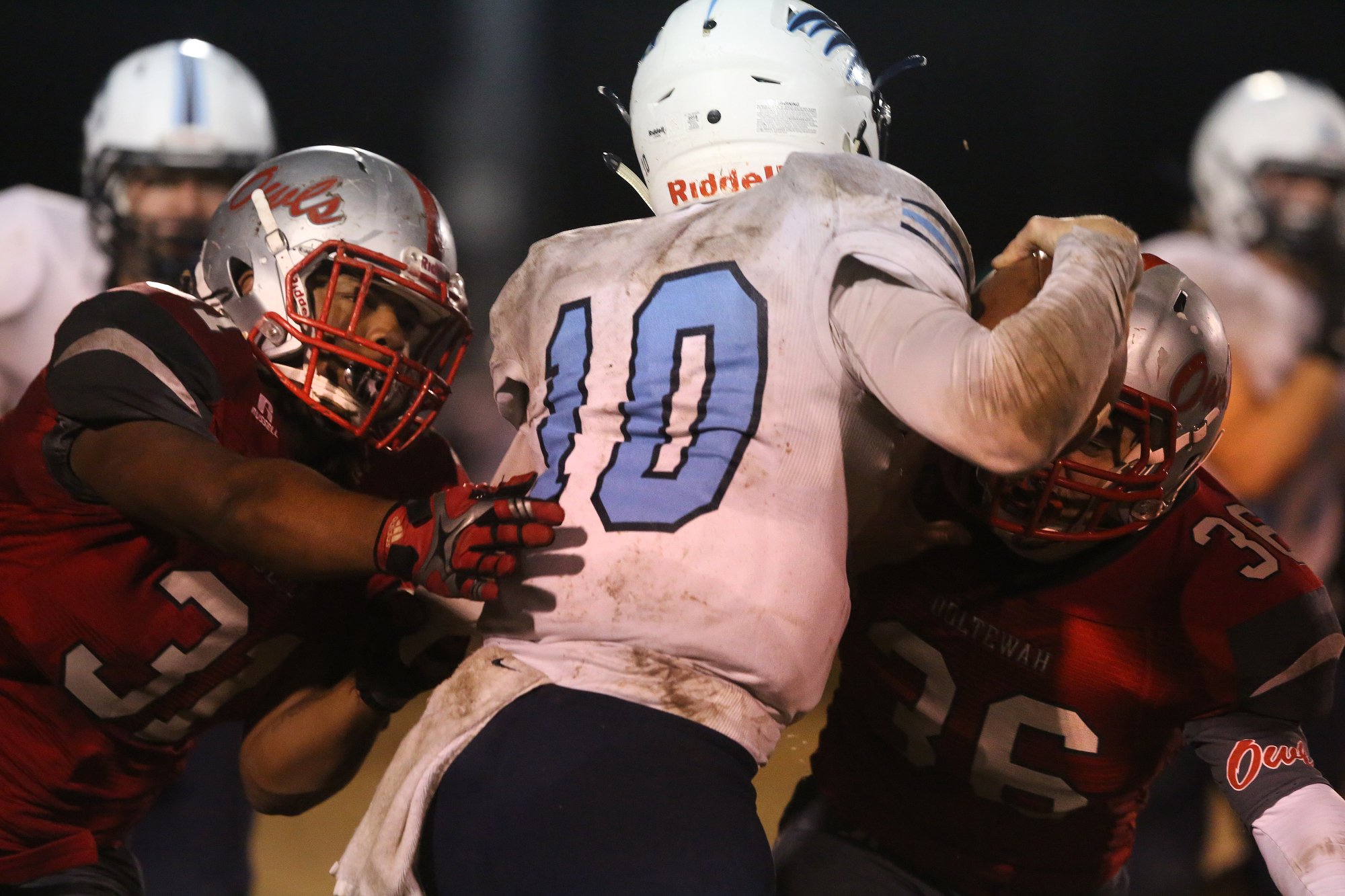 Ooltewah's Johnnie Chummy (31) and Josh Shevlin (36) tackle Hardin Valey quarterback Grayson Vaughn (10) during the first half of the Ooltewah vs. Hardin Valley football game at Jim Jarvis Field at Ooltewah High School Friday, November 2, 2018 in Ooltewah, Tennessee. The game was the first round of the Class 6A football playoffs.