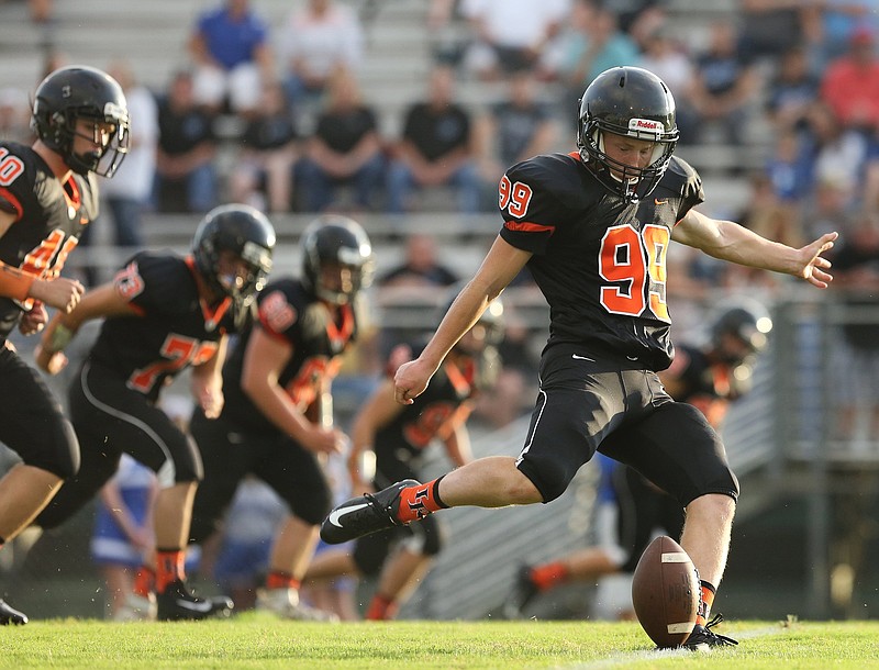 LaFayette's  Max Studdard (99) punts the ball during a scrimmage between Trion and LaFayette at LaFayette High School Thursday, August 9, 2018 in LaFayette, Georgia.