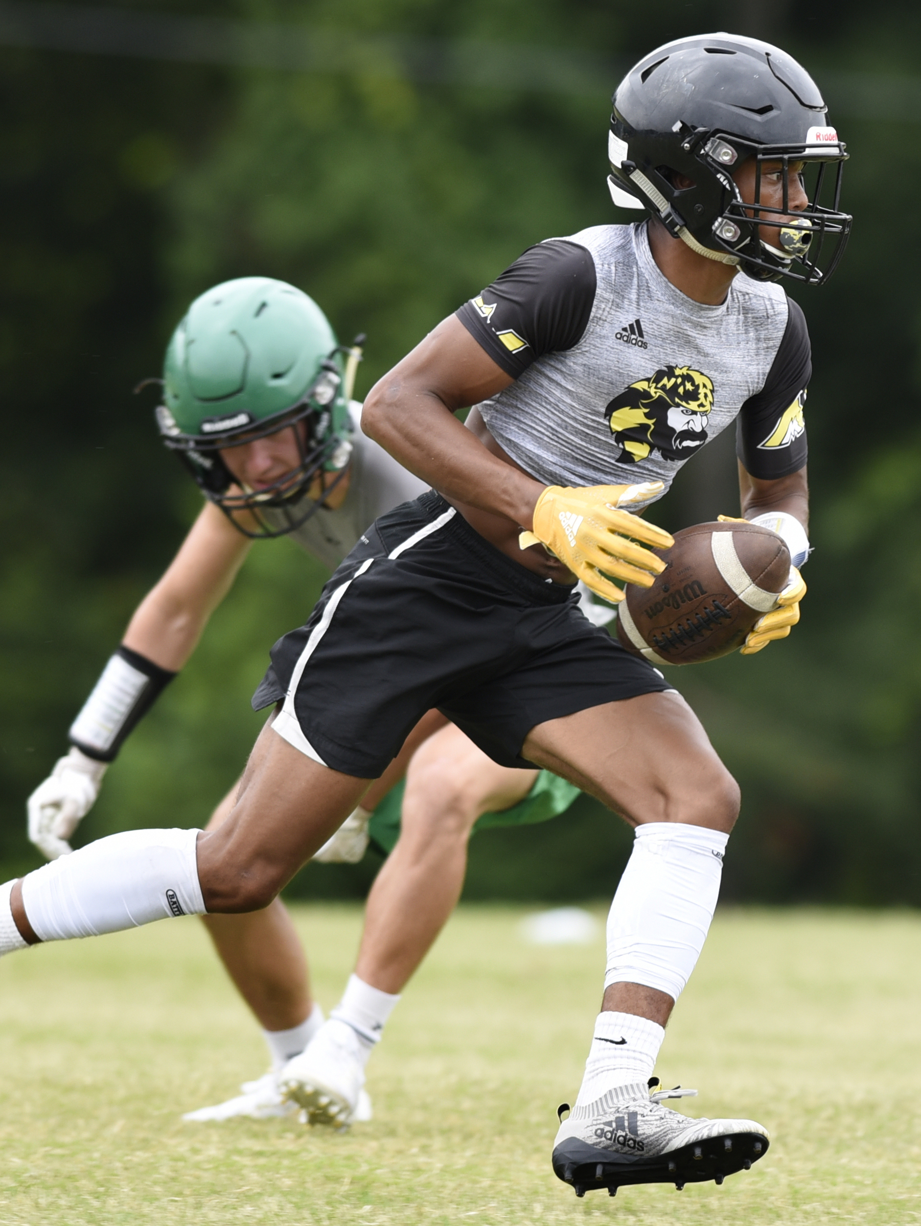 North Murray running back Dante Tidwell runs the ball downfield during a 7-on-7 scrimmage Thursday, June 21, 2018 at Southeast Whitfield High School in Dalton, Georgia.