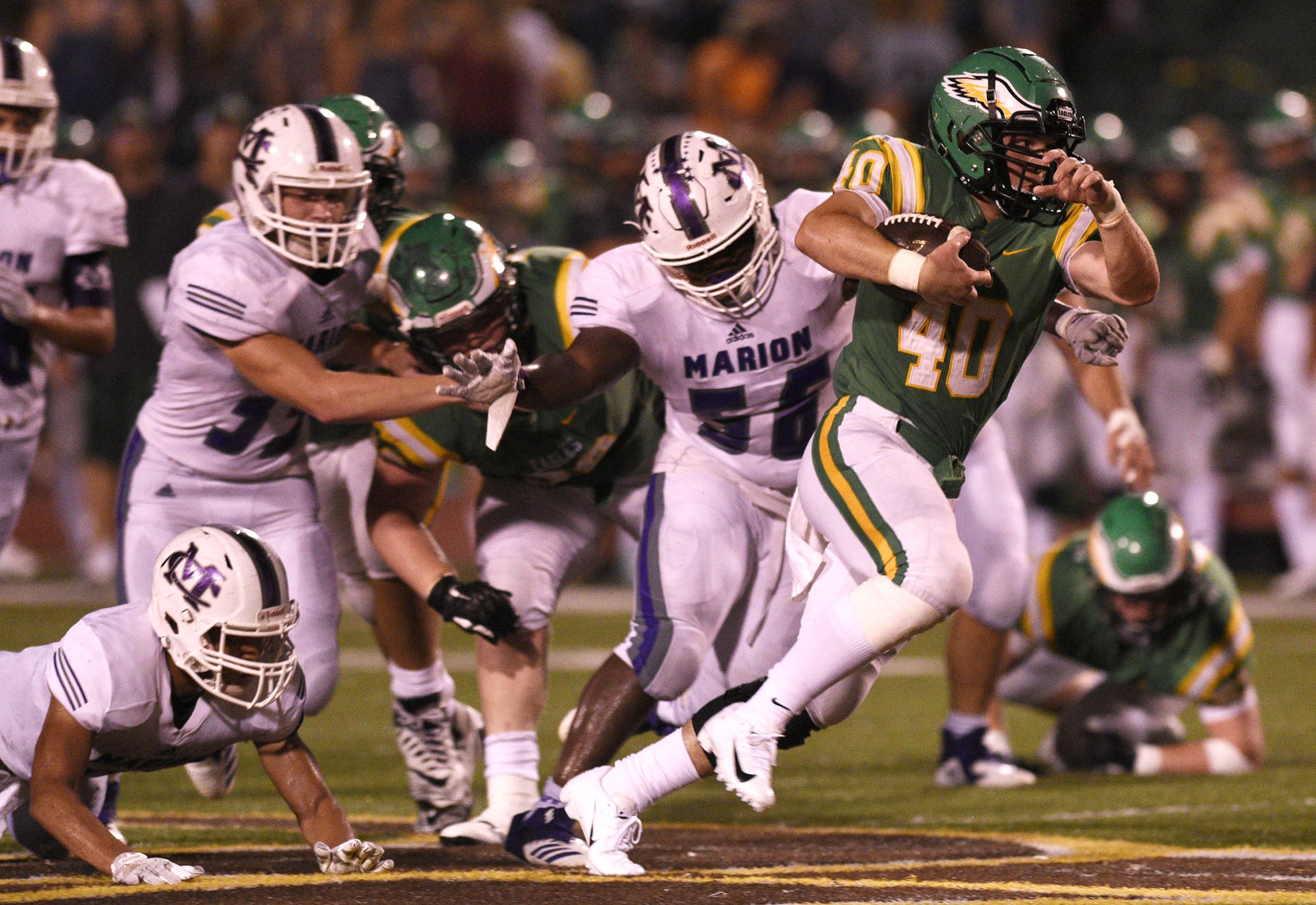 Rhea County's Bradley Goodwin (40) breaks into the open. The Marion County Warriors visited the Rhea County Golden Eagles in a TSSAA rivalry game on October 5, 2018.