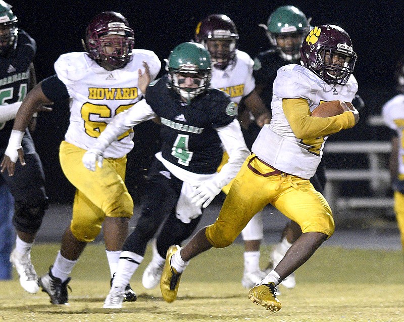 Eric Johnson (4) breaks downfield for the Tiger's final touchdown.  The Howard Hustling Tigers visited the East Hamilton Hurricanes in a TSSAA District game on October 26, 2018