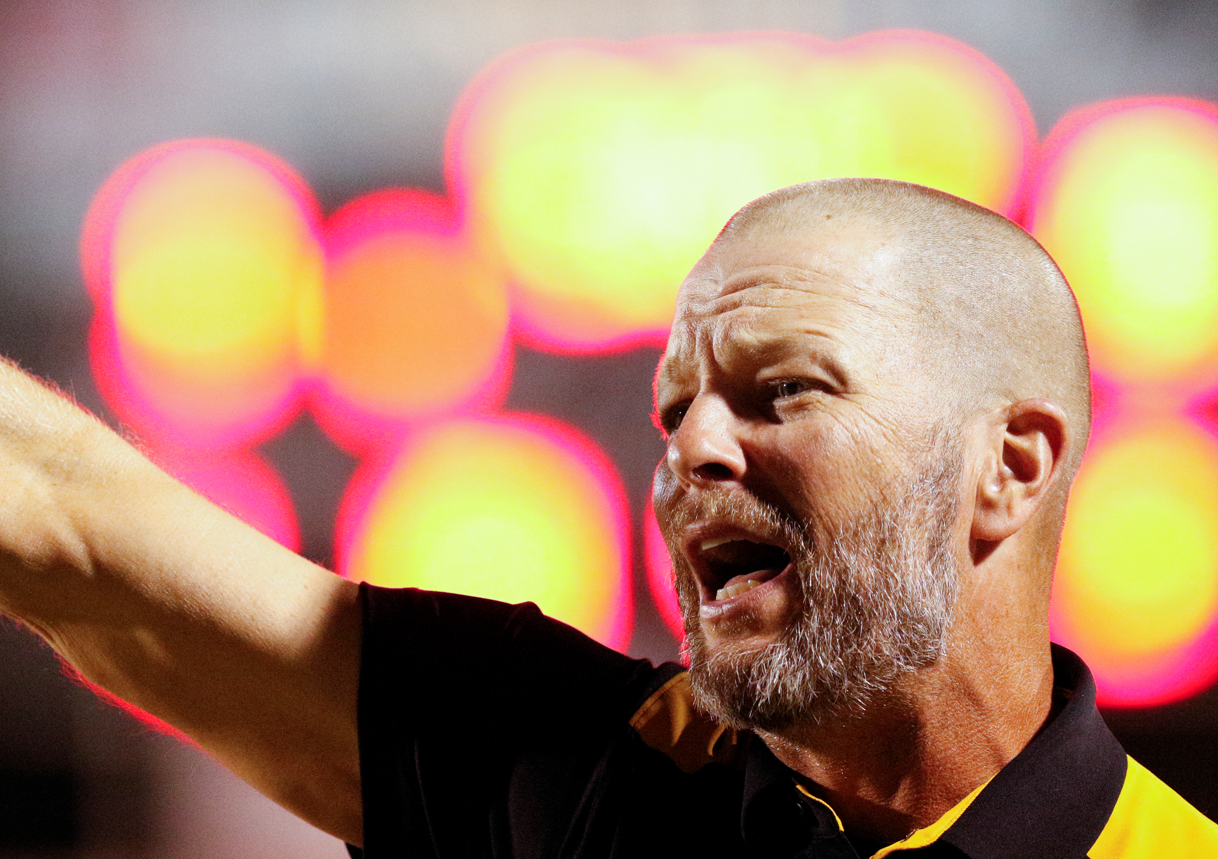 McMinn County football coach Bo Cagle shouts to players during their prep football game at Ooltewah High School on Thursday, Oct. 5, 2017, in Chattanooga, Tenn.