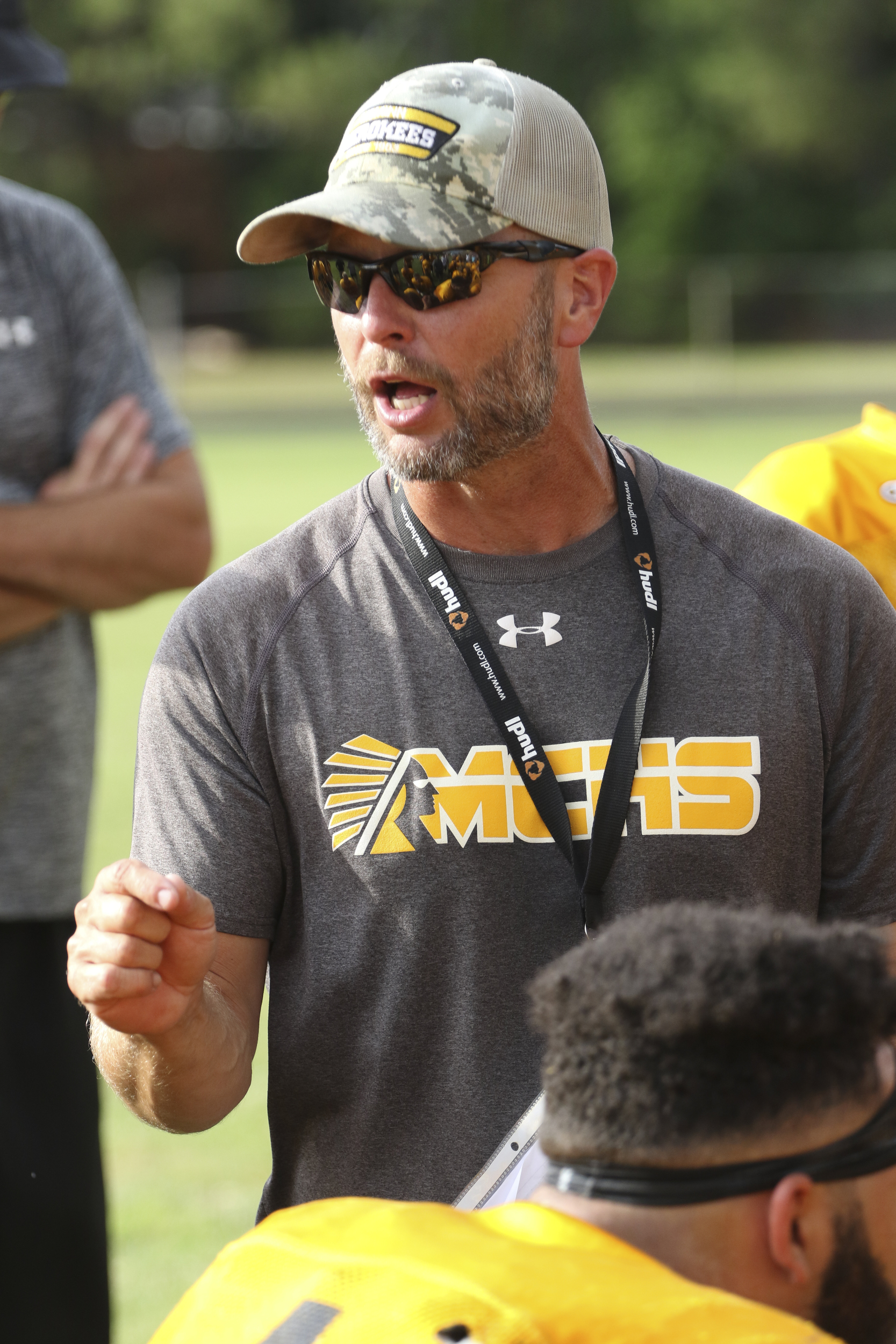 Staff Photo by Dan Henry / The Chattanooga Times Free Press- 7/29/16. McMinn head coach Bo Cagle speaks to his players at the conclusion of a scrimmage with Tyner Academy at the Rams' home field on Friday, July 29, 2016.