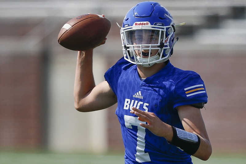 Boyd-Buchanan's Eli Evans looks to pass against Howard during the Best of Preps Football Jamboree on Saturday, Aug. 11, 2018 in Chattanooga, Tenn.