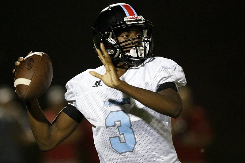 Brainerd's Xiyeer Lattimore (3) looks to pass against Signal Mountain at Signal Mountain Middle/High School on Friday, Sept. 28, 2018 in Signal Mountain, Tenn.