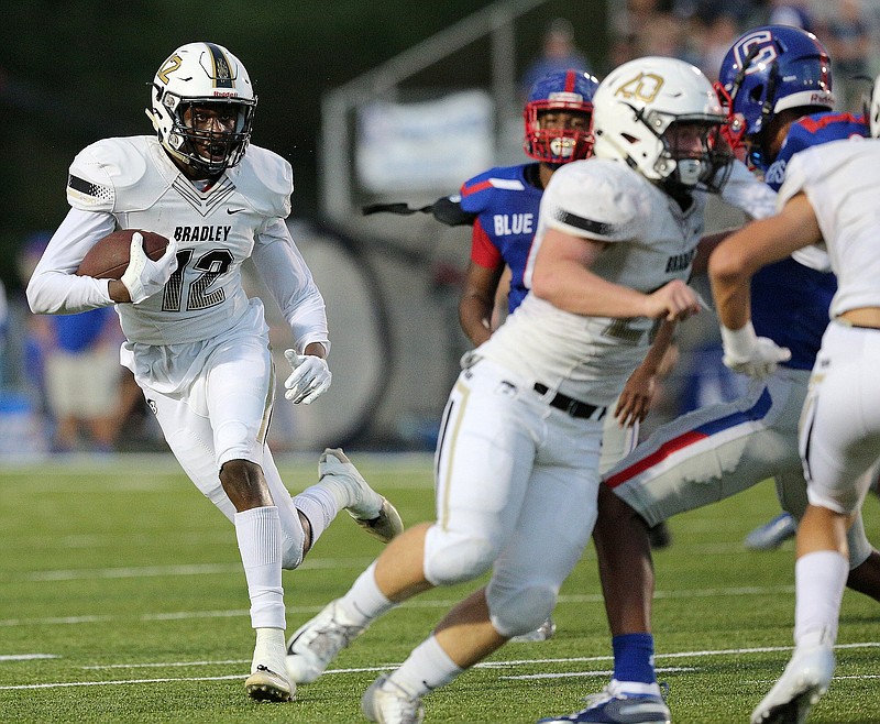 Bradley Central wide receiver Tray Curry advances the ball during last September's game at Cleveland High. Both teams are among the record 23 in the Best of Preps Jamboree this weekend at Finley Stadium.