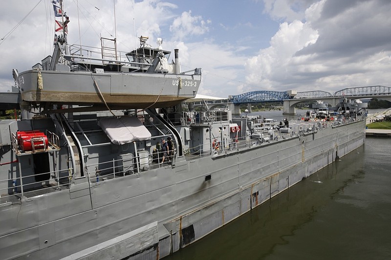 Staff photo by Doug Strickland
World War II Landing Ship Tank 325 is docked Thursday, Sept. 11, 2014, at Ross's Landing in Chattanooga, Tenn. Tours of LST 325, which participated in the D-Day Invasion in 1944, will be available until Sept. 17.