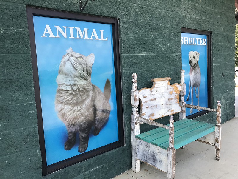 These sunscreens, added to the side of the Walker County Animal Shelter, are part of the shelter's recent upgrades. Advertising adoptable animals, they have already proven to be effective - three of the four featured have been adopted. / Staff photo by Sabrina Bodon