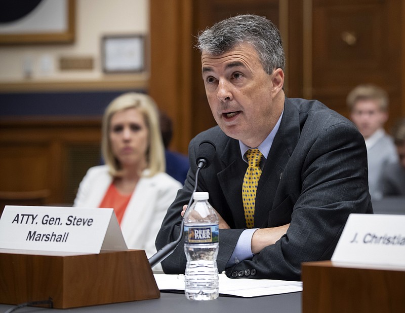 In this Friday, June 8, 2018, file photo, Alabama Attorney General Steve Marshall tells the House Judiciary Subcommittee on the Constitution and Civil Justice that his state will wrongly suffer a loss of representation if the 2020 census counts immigrants who are in the country illegally, on Capitol Hill in Washington. A coalition of 15 states, the District of Columbia and several major cities are opposing a lawsuit by the state of Alabama that would have the U.S. Census count only U.S. citizens and other legal residents in totals used for deciding how many congressional seats a state should have. (AP Photo/J. Scott Applewhite, File)