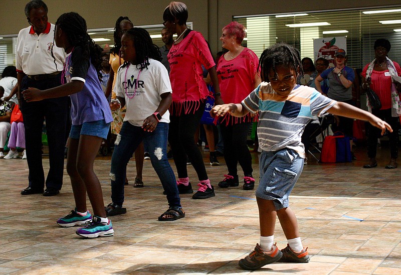 Kirin Rutledge, 4, dances during the 18th Annual Hamilton County Minority Health Fair at Eastgate Town Center on Saturday, Aug. 17, 2019. The event provides free health screenings and education to close gaps in health care disparities among minorities in the Chattanooga region. / Staff photo by Elizabeth Fite