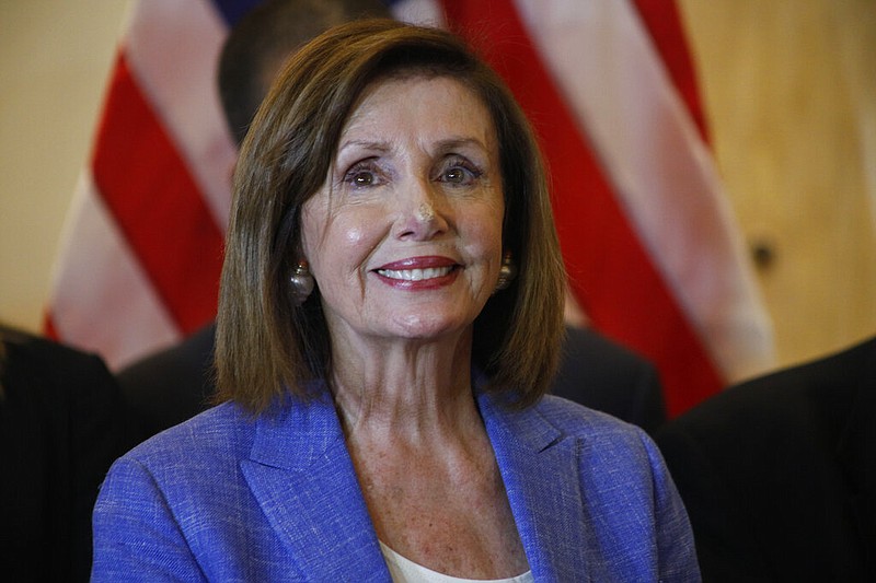 In this Aug. 10, 2019, file photo, House Speaker Nancy Pelosi smiles during a news conference at a hotel in Tegucigalpa, Honduras. There's an American leader whose words increasingly resonate abroad, who's adored in foreign capitals and who sends a message just by her arrival. House Speaker Nancy Pelosi has emerged as an alternative ambassador in the Trump era.