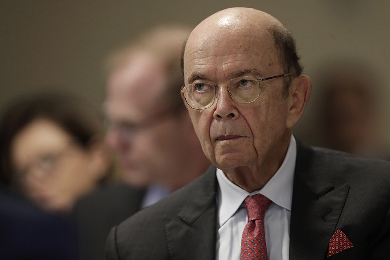 FILE - In this Aug. 1, 2019, file photo U.S. Commerce Secretary Wilbur Ross attends a meeting of the 17th Latin American Infrastructure Leadership Forum, in Brasilia, Brazil. The U.S. government gave chipmakers and technology companies a 90-day extension to sell products to technology giant Huawei. (AP Photo/Eraldo Peres, File)