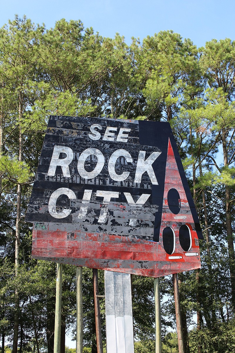 This is a photo of a See Rock City birdhouse sign before being repainted. / Photo courtesy of SRC Inc.