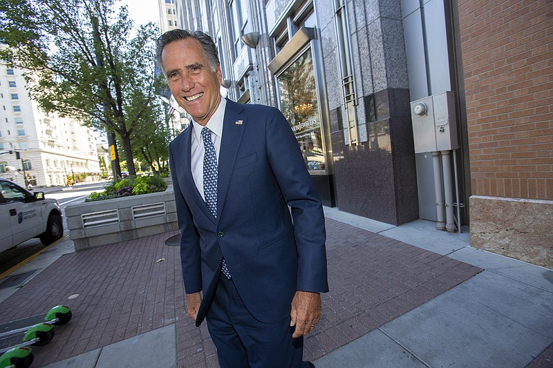 Senator Mitt Romney speaks at the Sutherland Institute in Salt Lake City on Monday, Aug. 19, 2019. Romney says he believes climate change is happening and human activity is a significant contributor.  (Scott G Winterton/The Deseret News via AP)
