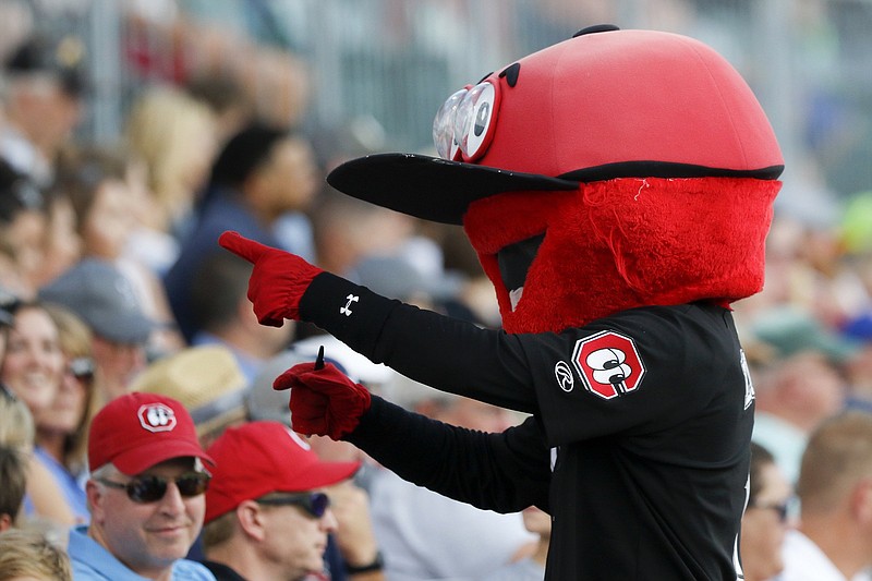 Chattanooga Lookouts mascot Looie points at a fan during a previous baseball game. Looie will be on hand for the team's final five home games, which begin Friday night.