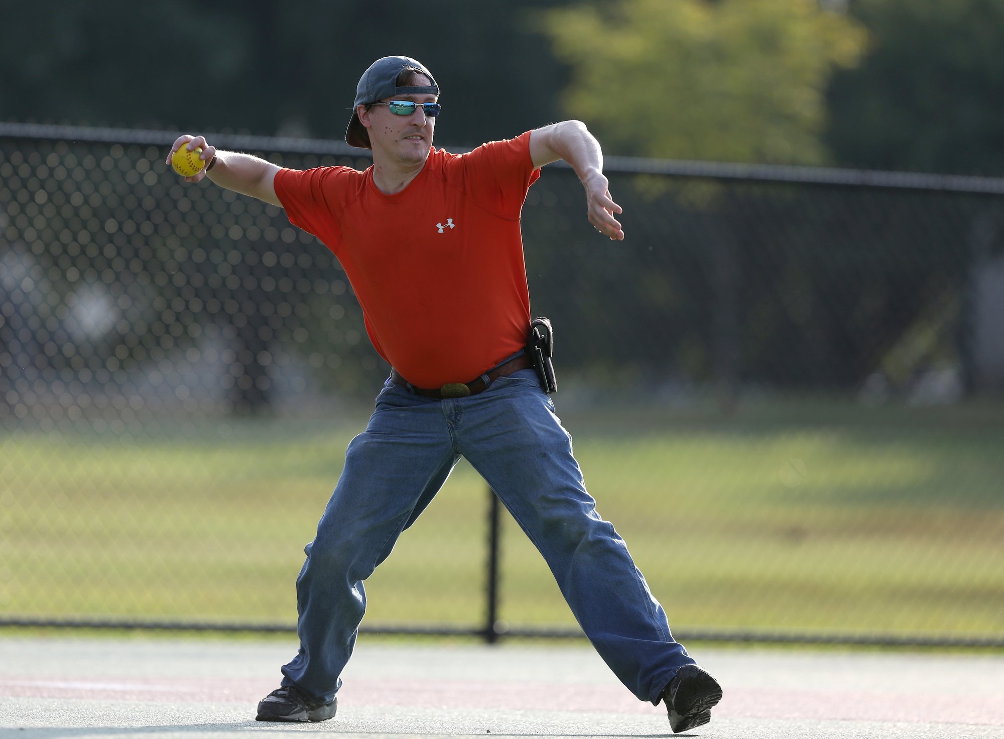 Staff photo by Erin O. Smith / Zachary Bell throws a ball to first during the Miracle League survivors vs. miracles ball game August 20, 2019 in Chattanooga, Tennessee. The Chattanooga Area Brain Injury Association board members and support group members participated in the event as well.