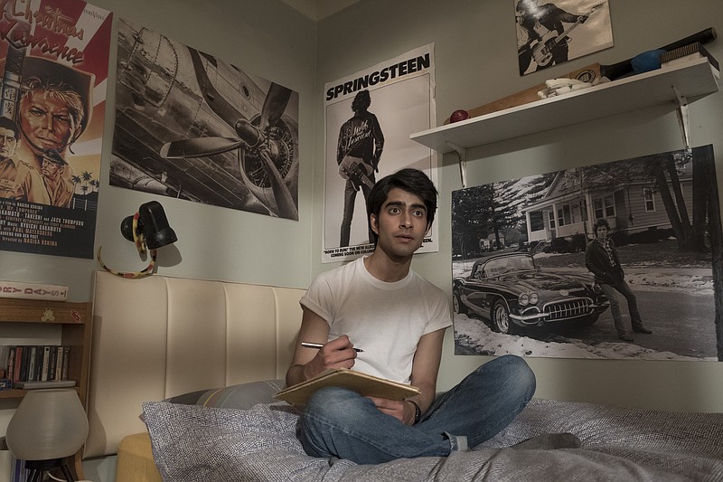 This image provided by Warner Bros. Entertainment Inc. shows Viveik Kalra in a scene from "Blinded by the Light," a Warner Bros. Pictures release in which Kalra plays Javed, a Pakistani-British teen whose life is transformed when a friend introduces him to Bruce Springsteen's music in 1987 Britain. (Nick Wall/Warner Bros. Entertainment Inc. via AP)