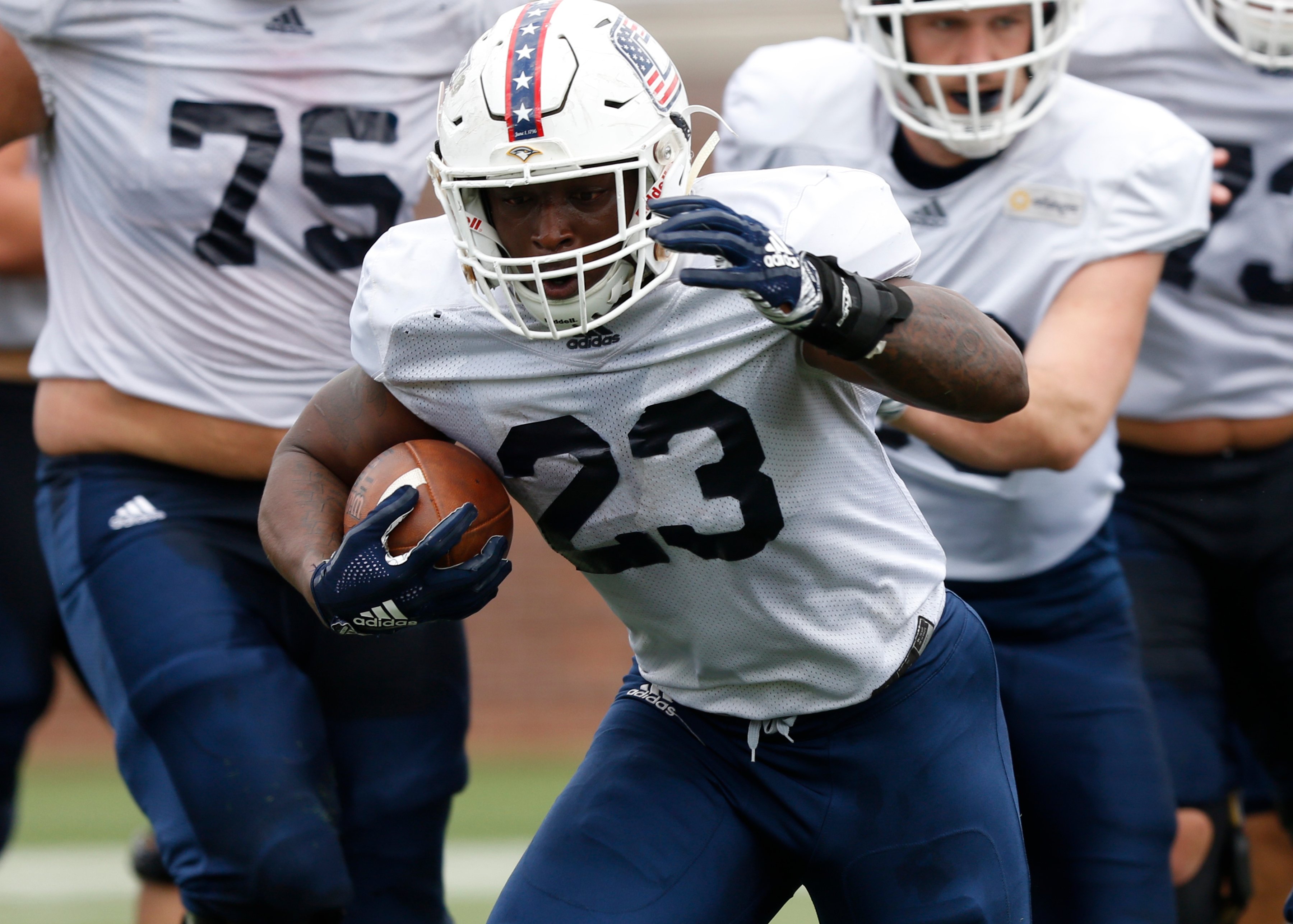 UTC running back Tyrell Price carries the ball during the football Mocs' spring showcase at Finley Stadium in March 2019.