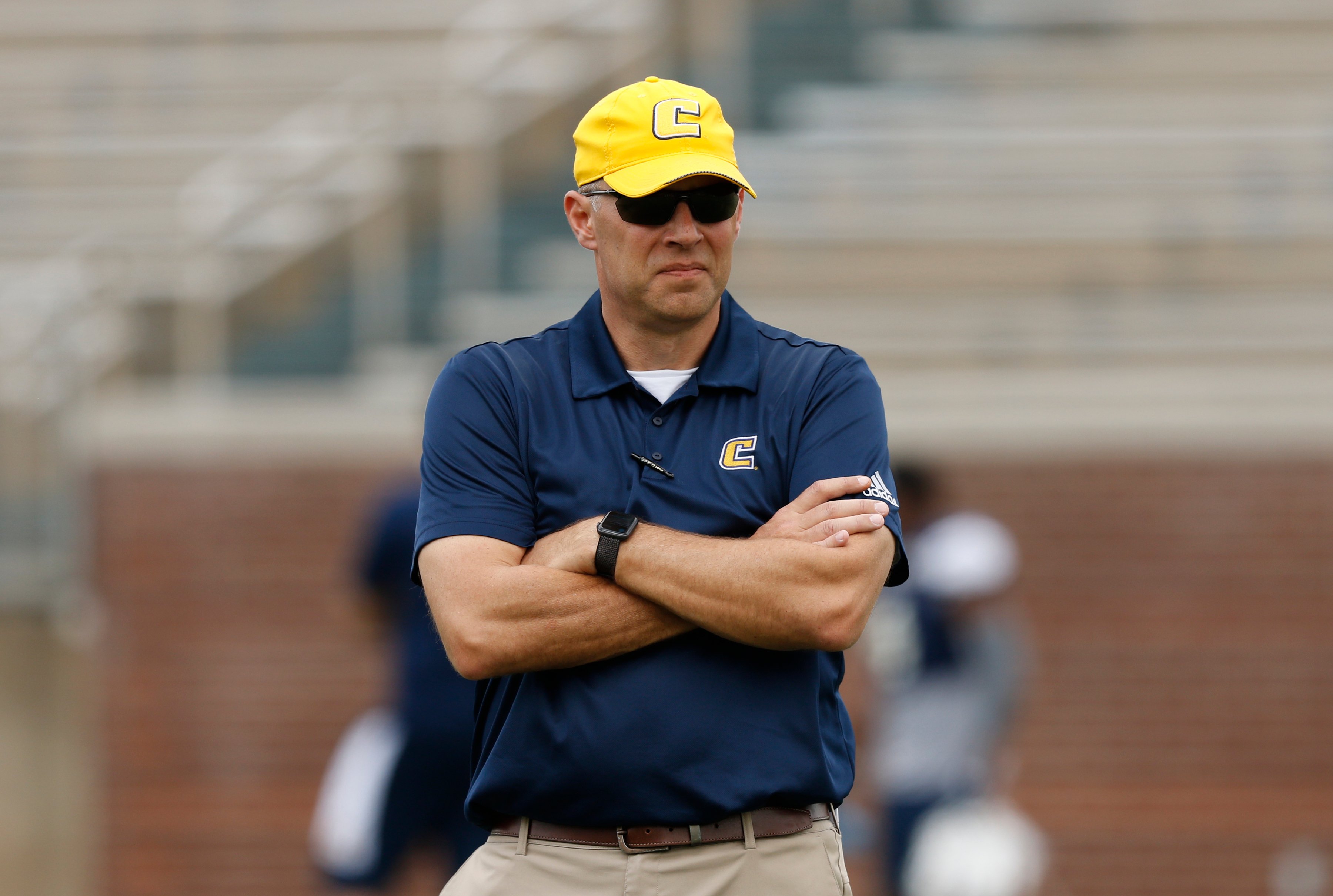 Chattanooga head football coach Rusty Wright watches during the University of Tennessee at Chattanooga spring football scrimmage at Finley Stadium on Saturday, March 30, 2019, in Chattanooga, Tenn.